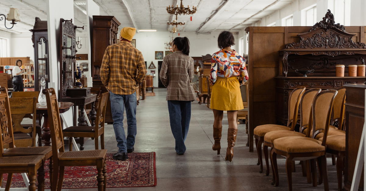 people in a secondhand furniture store